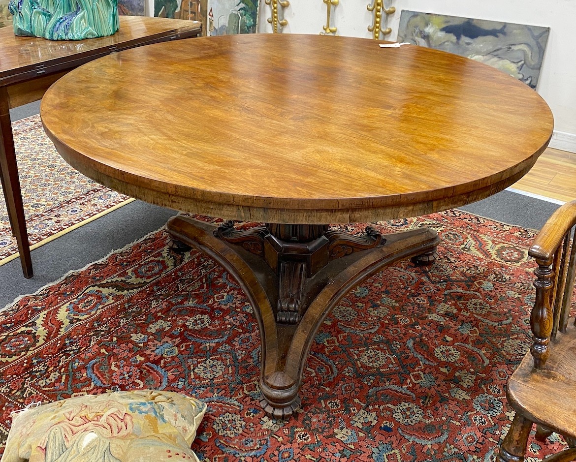 A William IV circular rosewood tilt top breakfast table, diameter 135cm, height 72cm